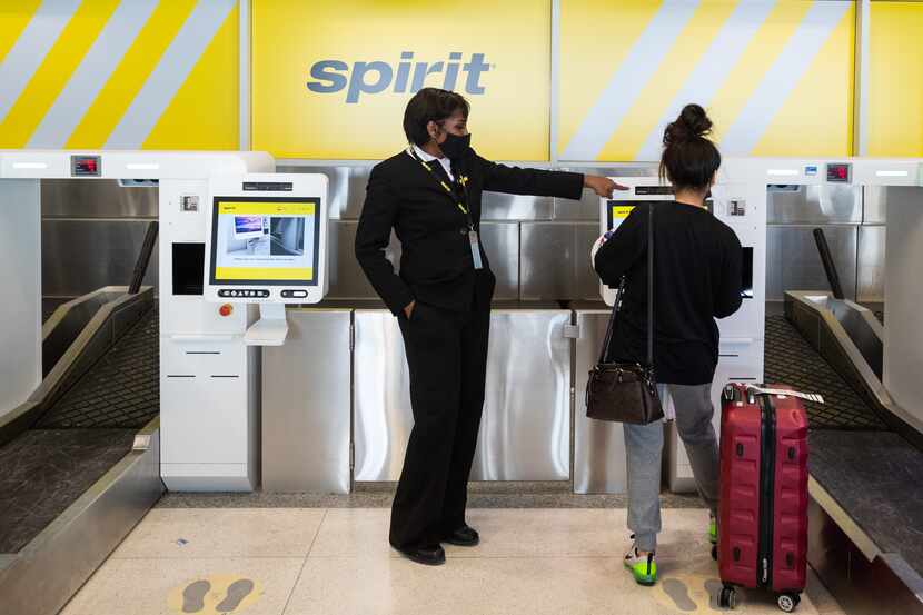 Janae Lewis Tantzen (left), a Spirit Airlines customer service agent, worked with Alfonsa...
