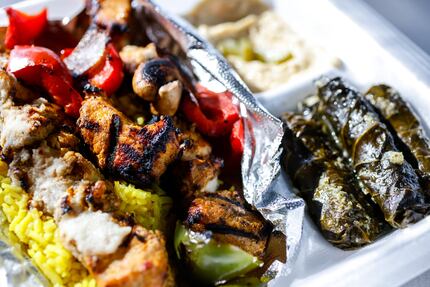 One of Hedary's Fresh Mediterranean's most-ordered items is the chicken kabobs, on left,...