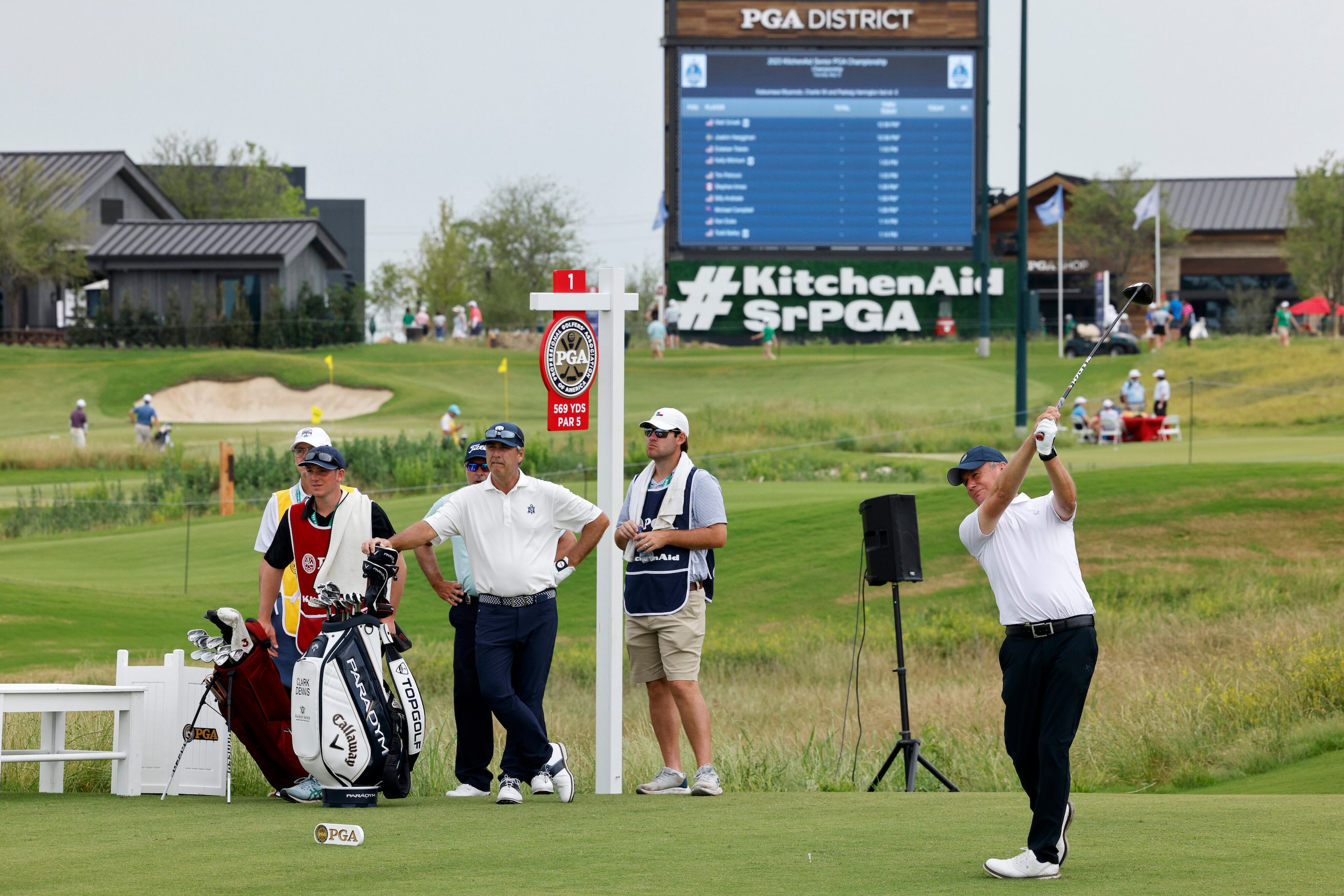 Paul Eales of England watches his tee shot on the first hole during the first round of the...