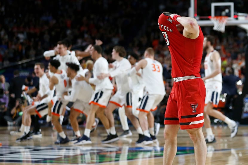 Texas Tech Red Raiders guard Matt Mooney (13) dejected as Virginia Cavaliers celebrates a...