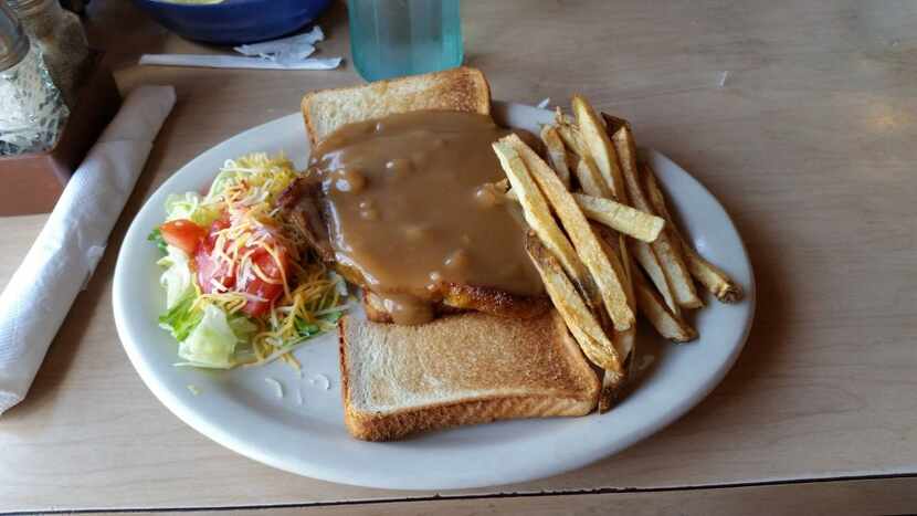 Open-face hot roast beef sandwiches are among the variety of dishes on the menu at Isaack...