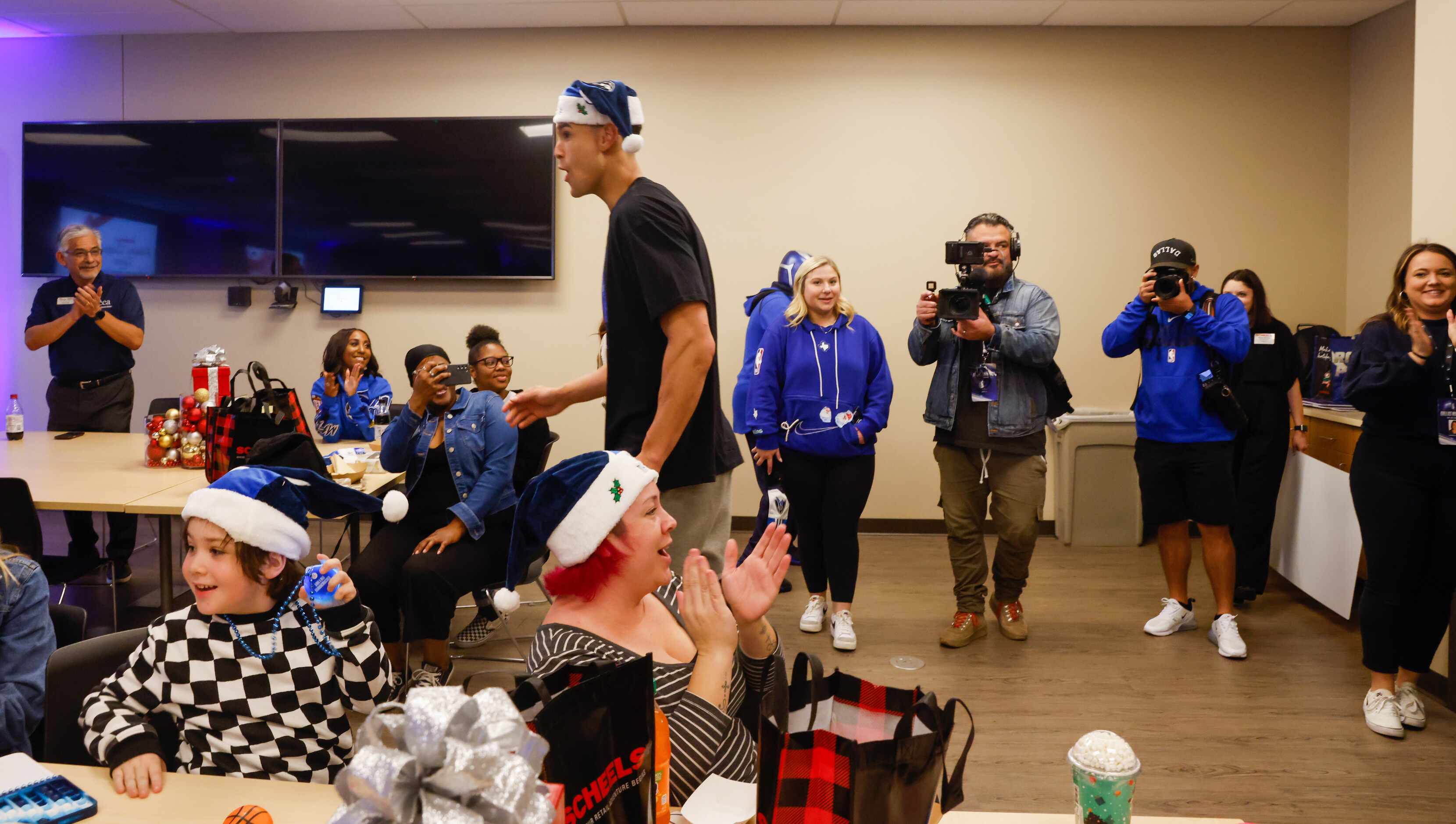 The Dallas Mavericks surprise families with a shopping spree for families of Christian...
