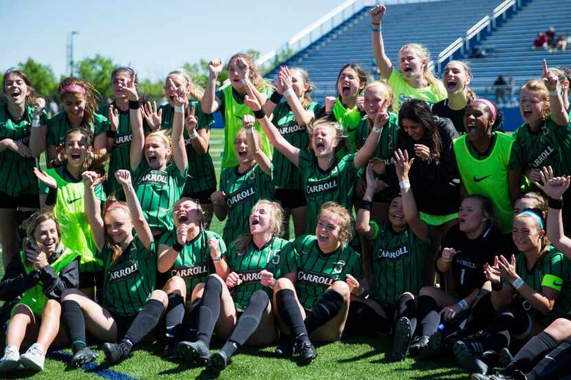 Southlake Carroll celebrates a 2-0 win after a UIL conference 6A girls state semifinal...