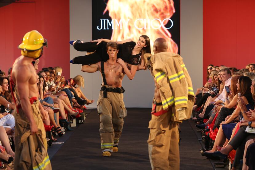 Models on the runway for Jimmy Choo during Fashion's Night Out at Highland Park Village with...