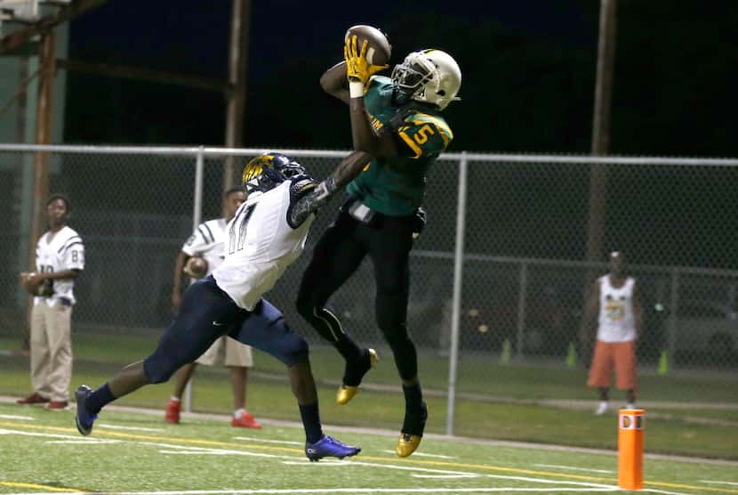 Madison wide receiver Danny Gray (5) makes the catch for a touchdown as Life Oak Cliff...
