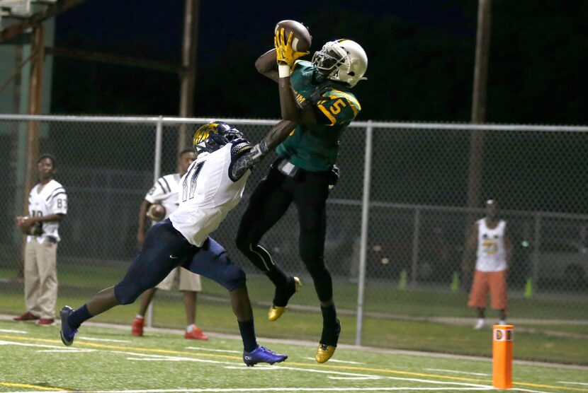 Madison wide receiver Danny Gray (5) makes the catch for a touchdown as Life Oak Cliff...