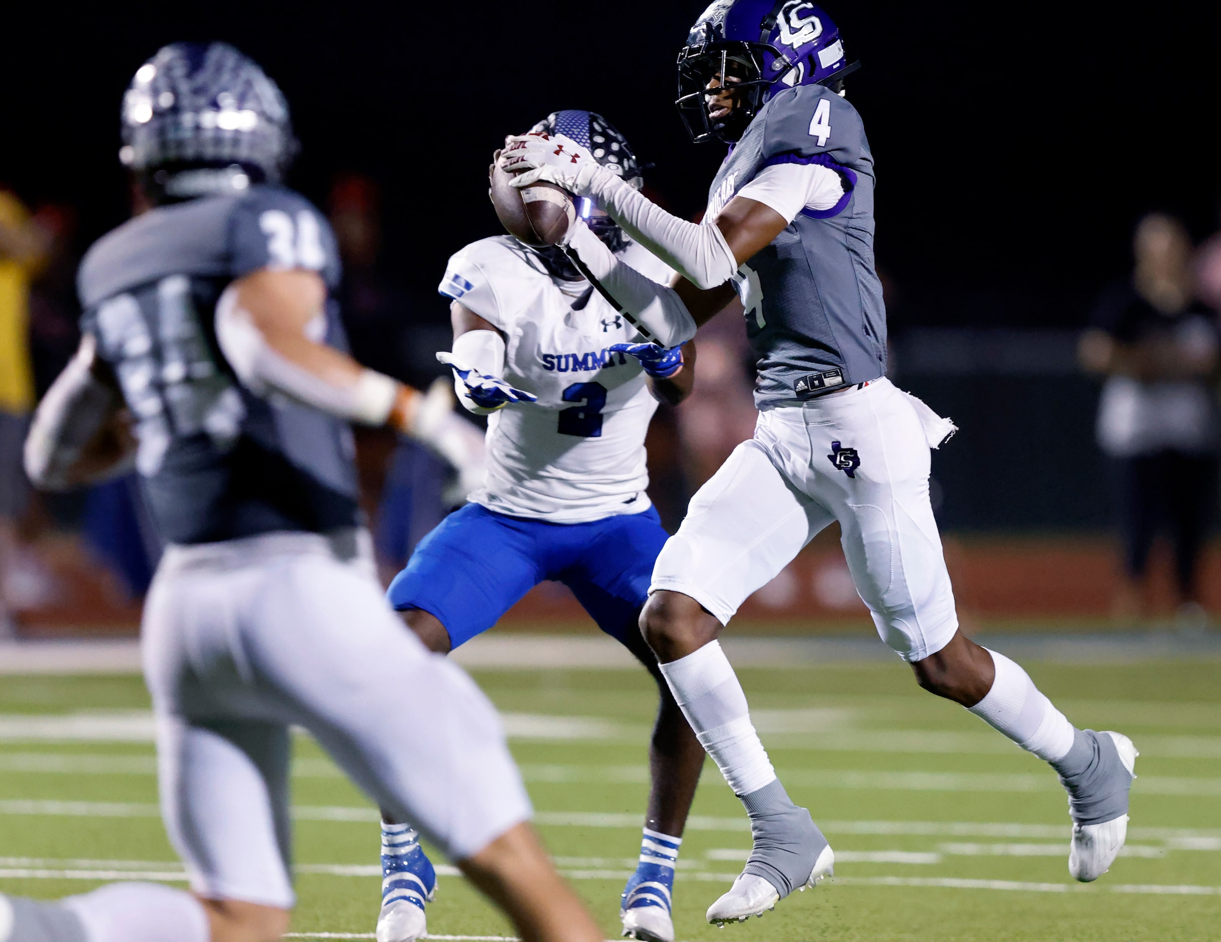 College Station linebacker Denim Day (4) intercepts a pass by Mansfield Summit during the...