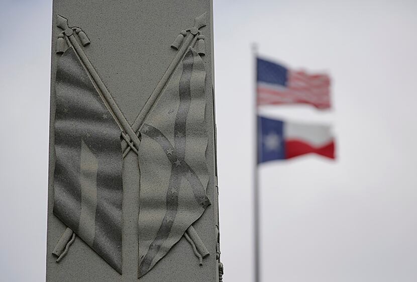 The Confederate flag is seen on a monument to Hood's Texas Brigade at the Texas State...