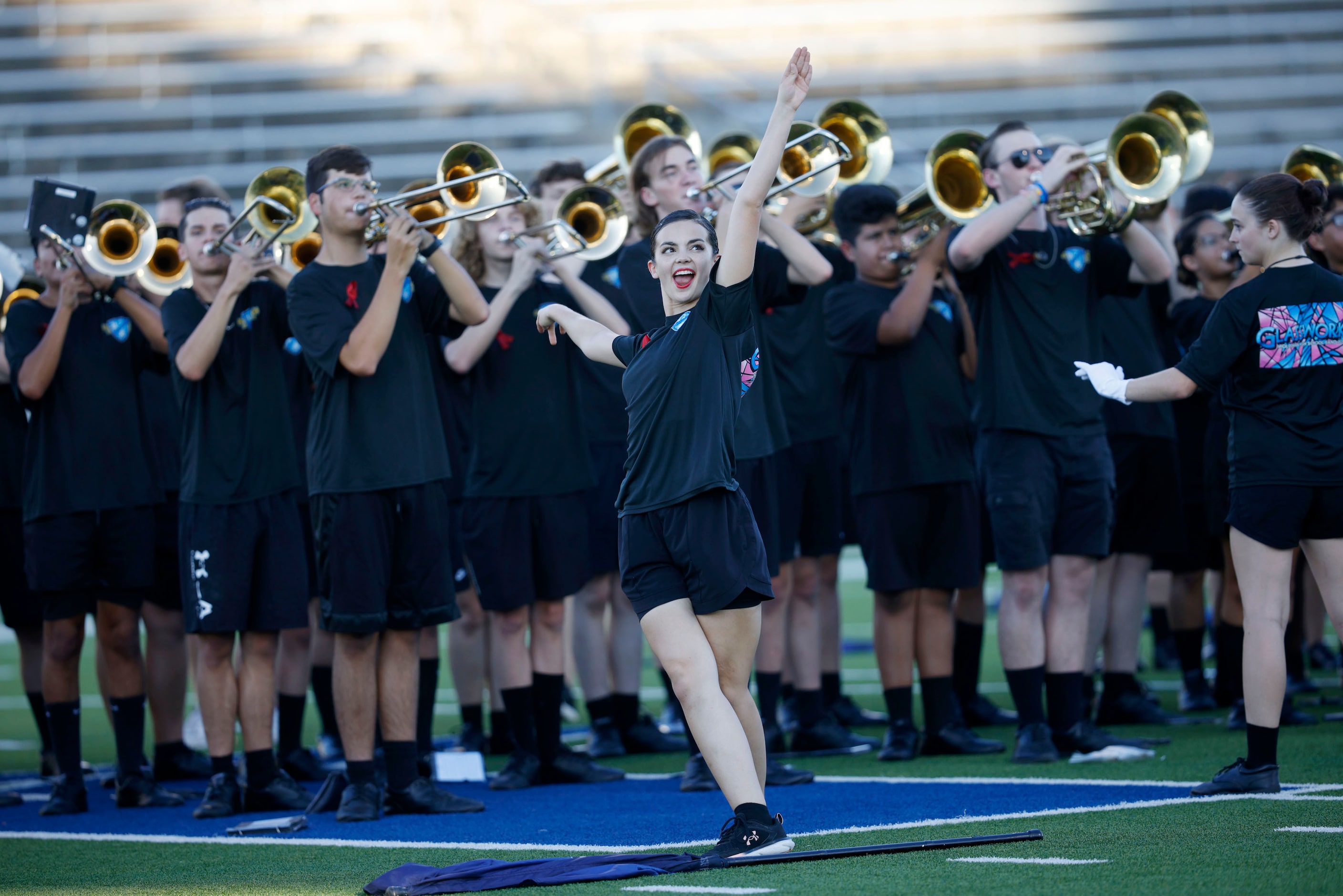 Midlothian marching band members perform before a high school football game against Kimball,...