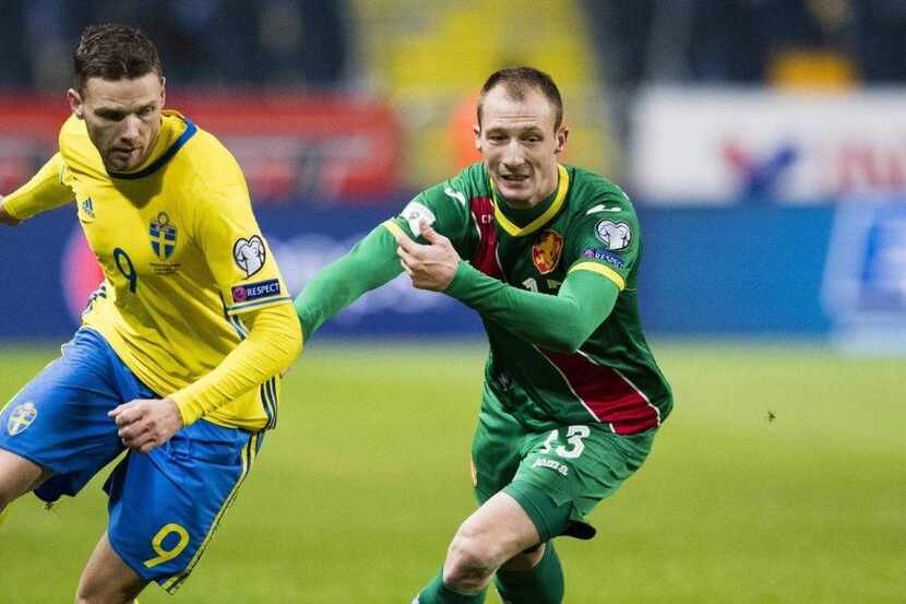 New FC Dallas signing Anton Nedyalkov challenges a Swedish player in a 2018 World Cup...