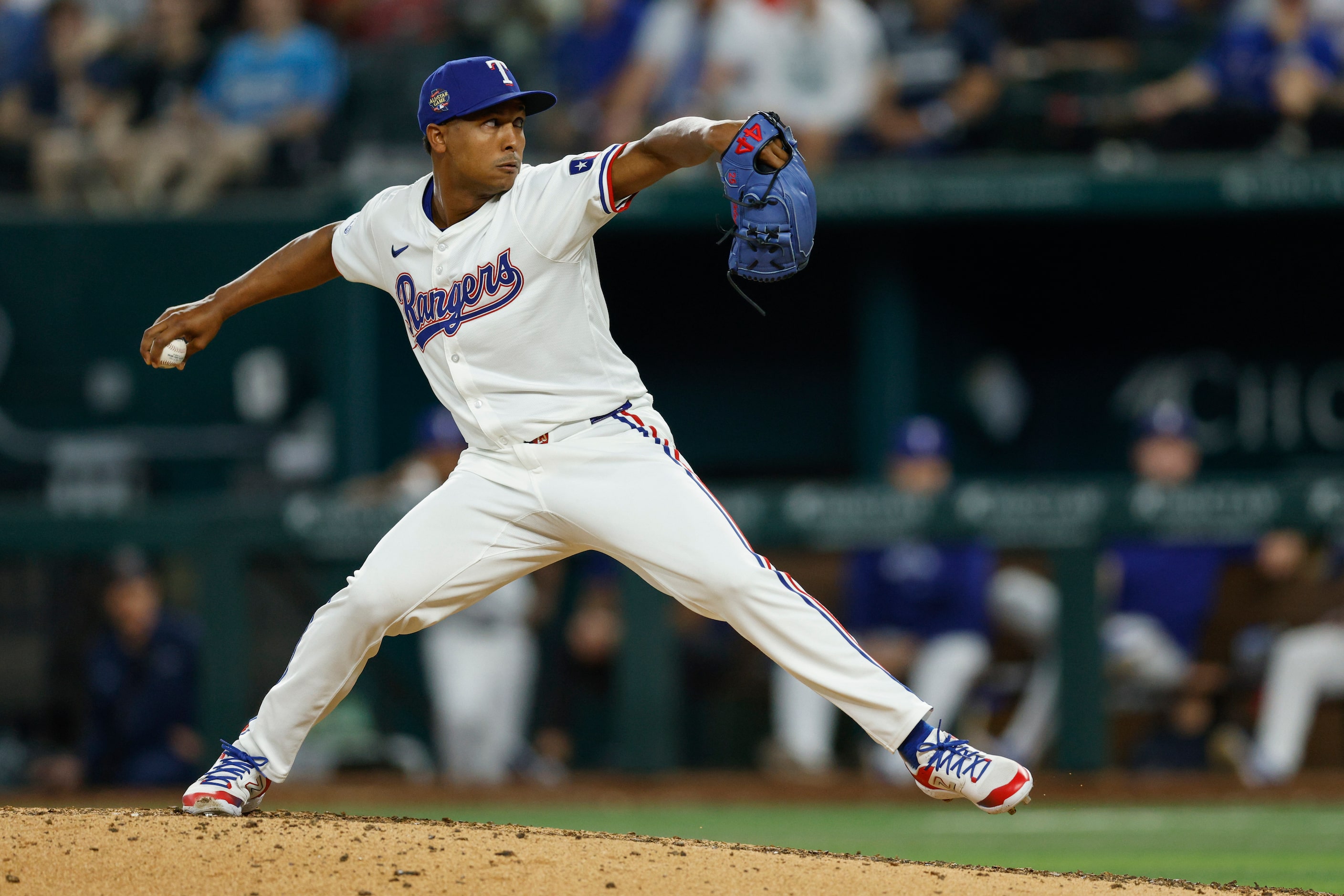 Texas Rangers relief pitcher Jose Leclerc (25) delivers a pitch during the eighth inning...