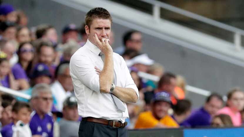 Orlando City head coach James O'Connor watches his team against the Chicago Fire during the...