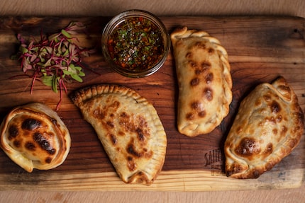 Chimichurri's empanadas are made with beef, ham, mushroom and humita (corn).