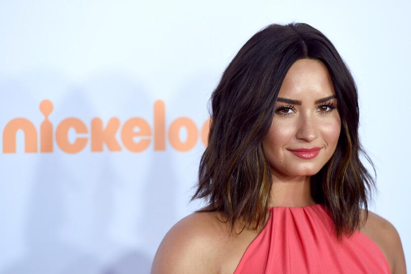 FILE - In this March 11, 2017,  file photo, Demi Lovato arrives at the Kids' Choice Awards...