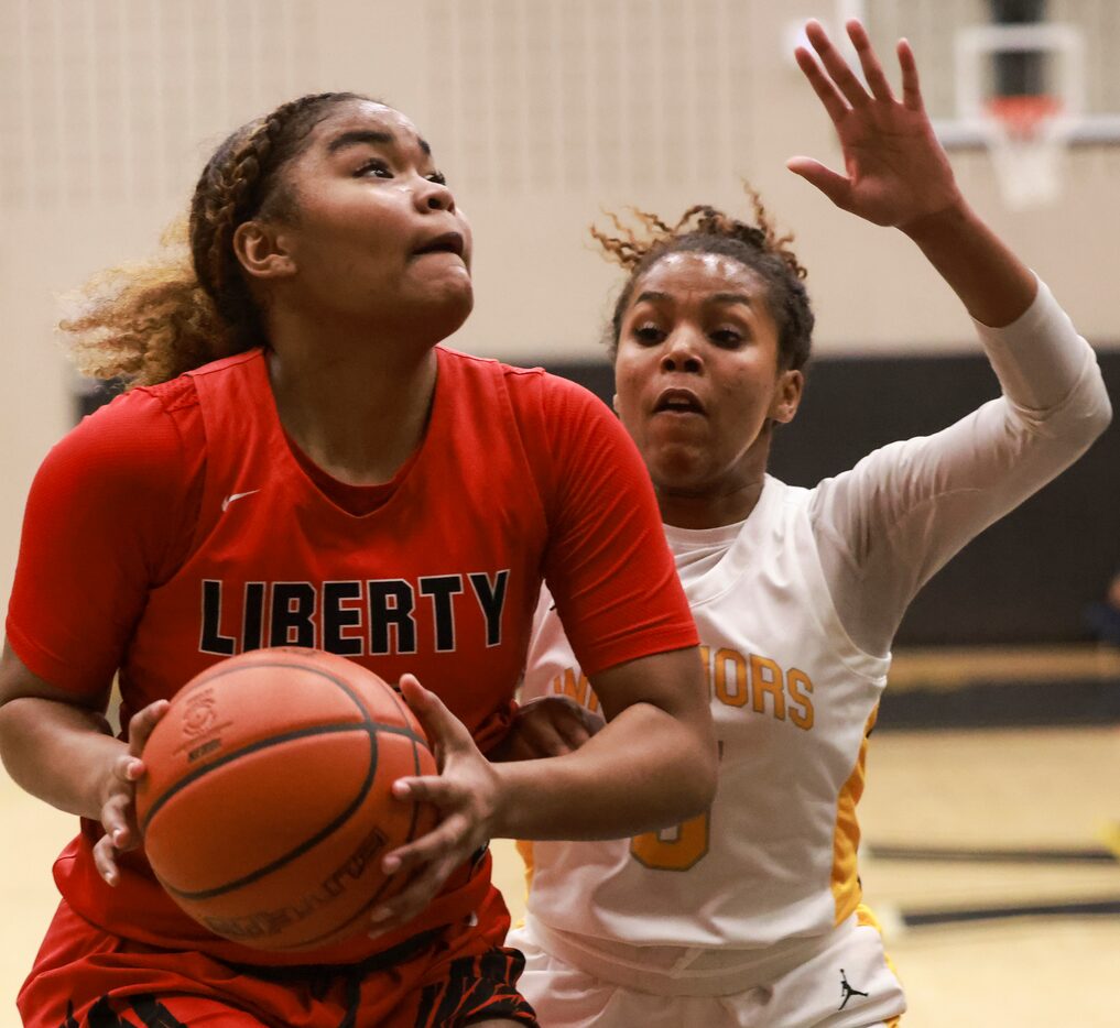 Frisco Memorial High School’s Sydney Murphy (5) defends Frisco Liberty High School’s Keyera...