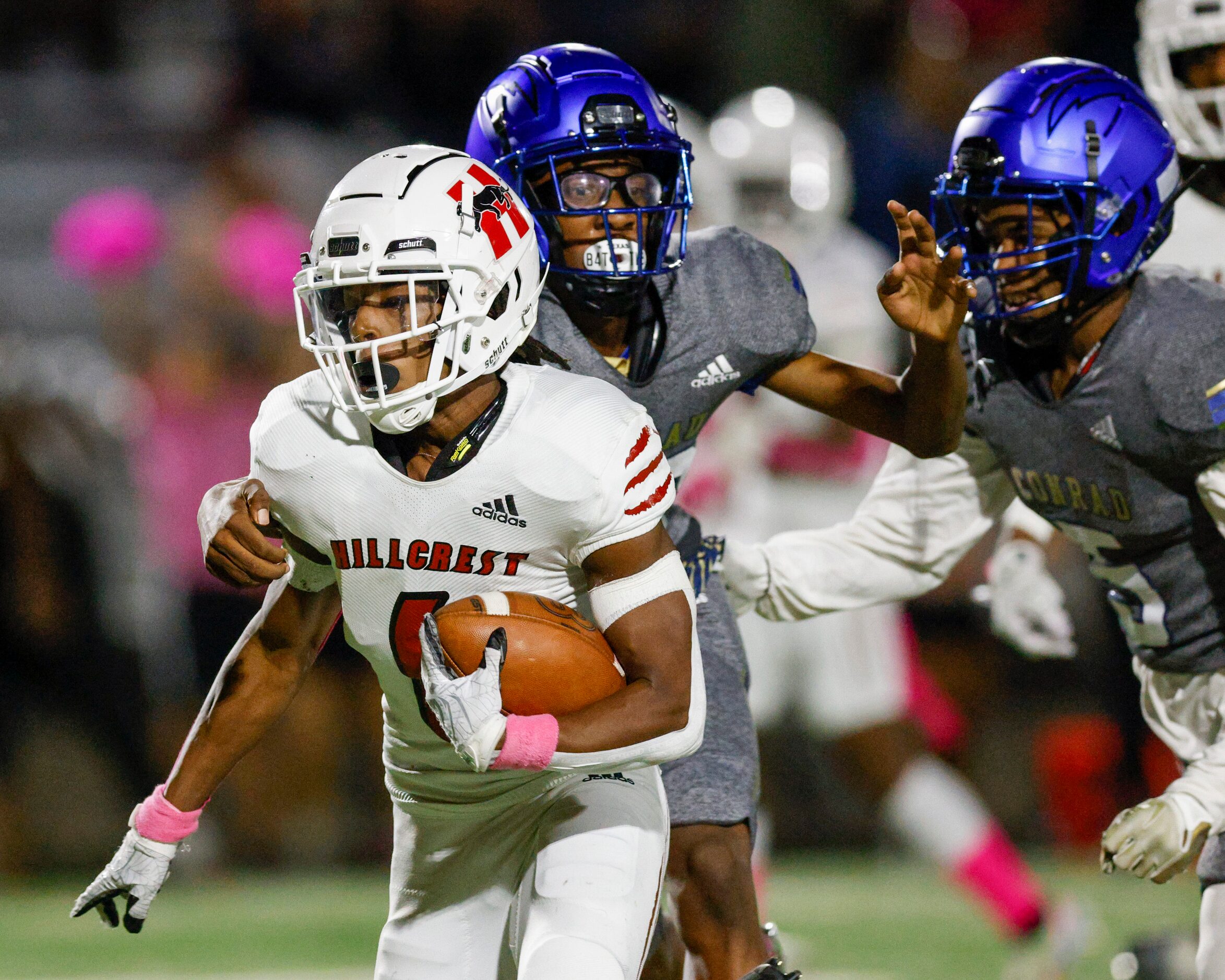 Hillcrest wide receiver Jaden Hodge (6) slips through a tackle during the first half of a...