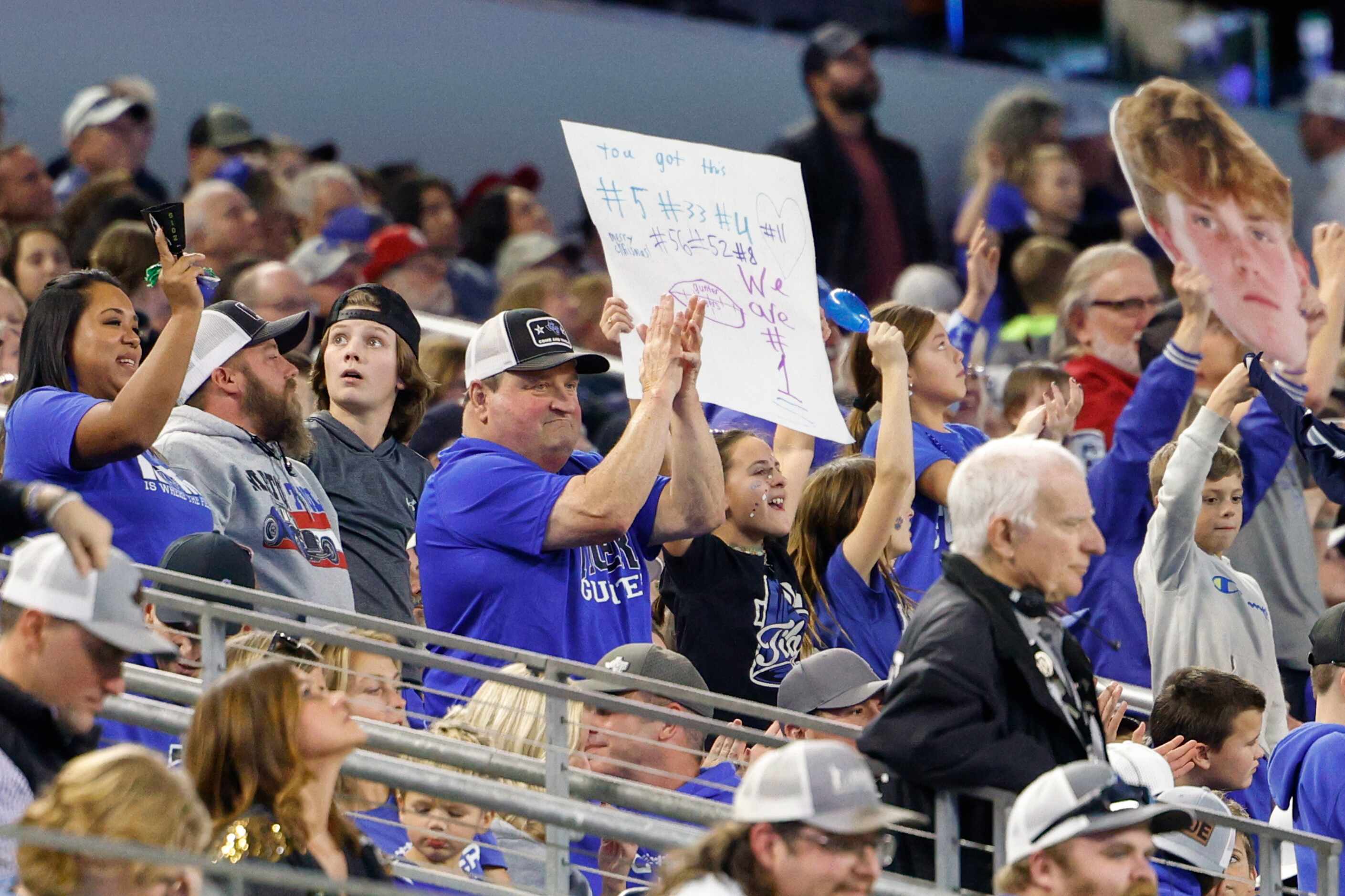 Gunter fans celebrate a touchdown during the second half of the Class 3A Division II state...