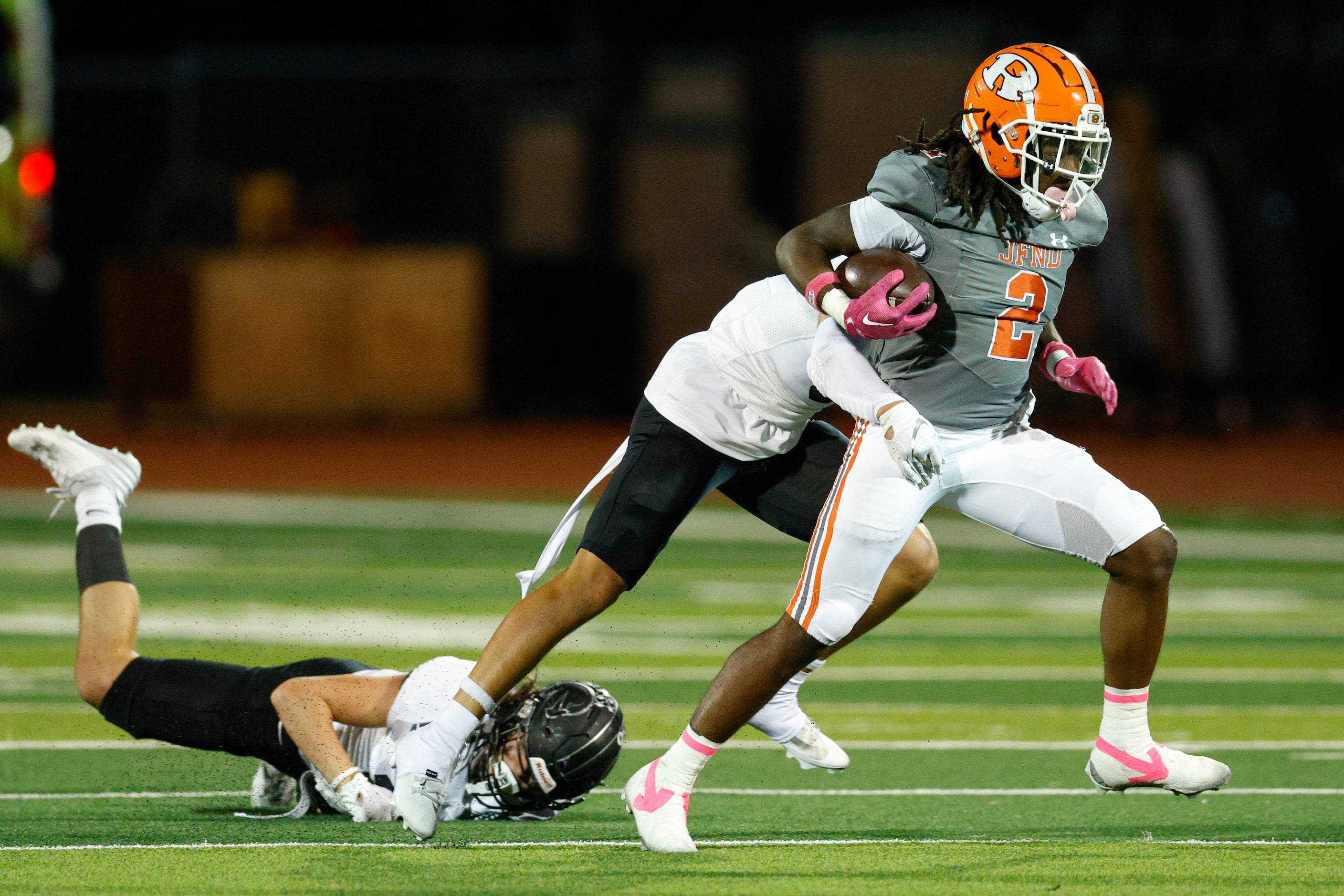 North Forney’s Caleb Holt (6) tackles Rockwall running back Ashten Emory (2) during the...