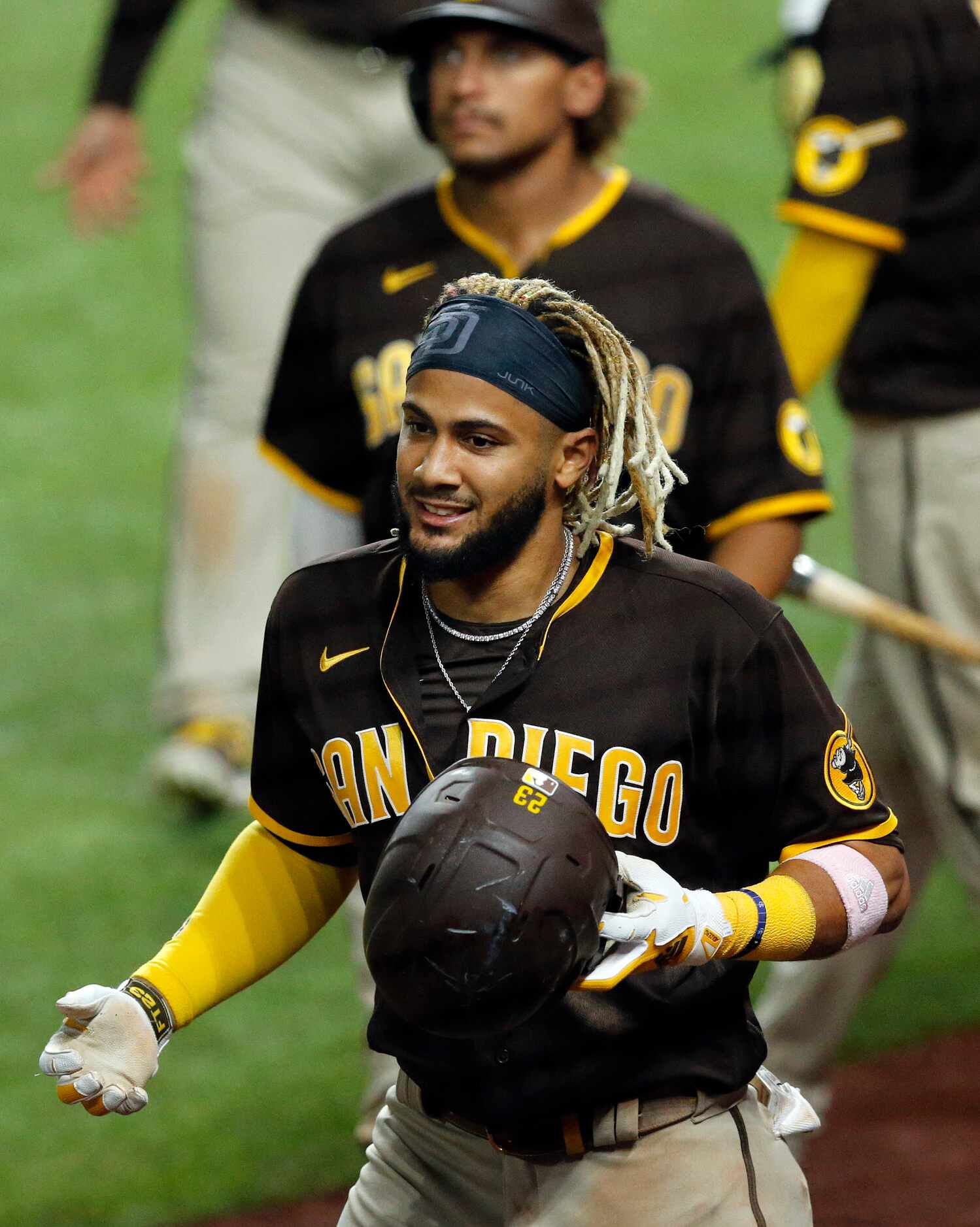 San Diego Padres Fernando Tatis Jr. (23) flashes a smile after his eighth inning grand slam...