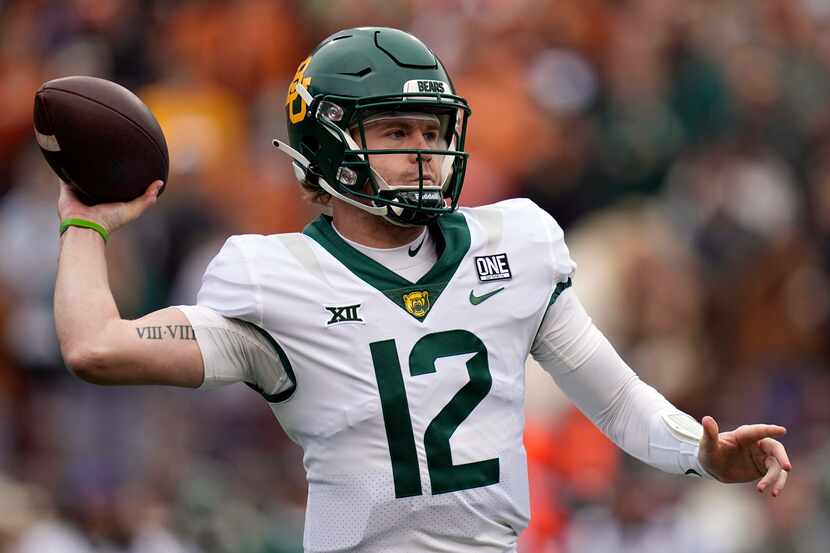 FILE - Baylor quarterback Blake Shapen looks to throw against Texas during the first half of...