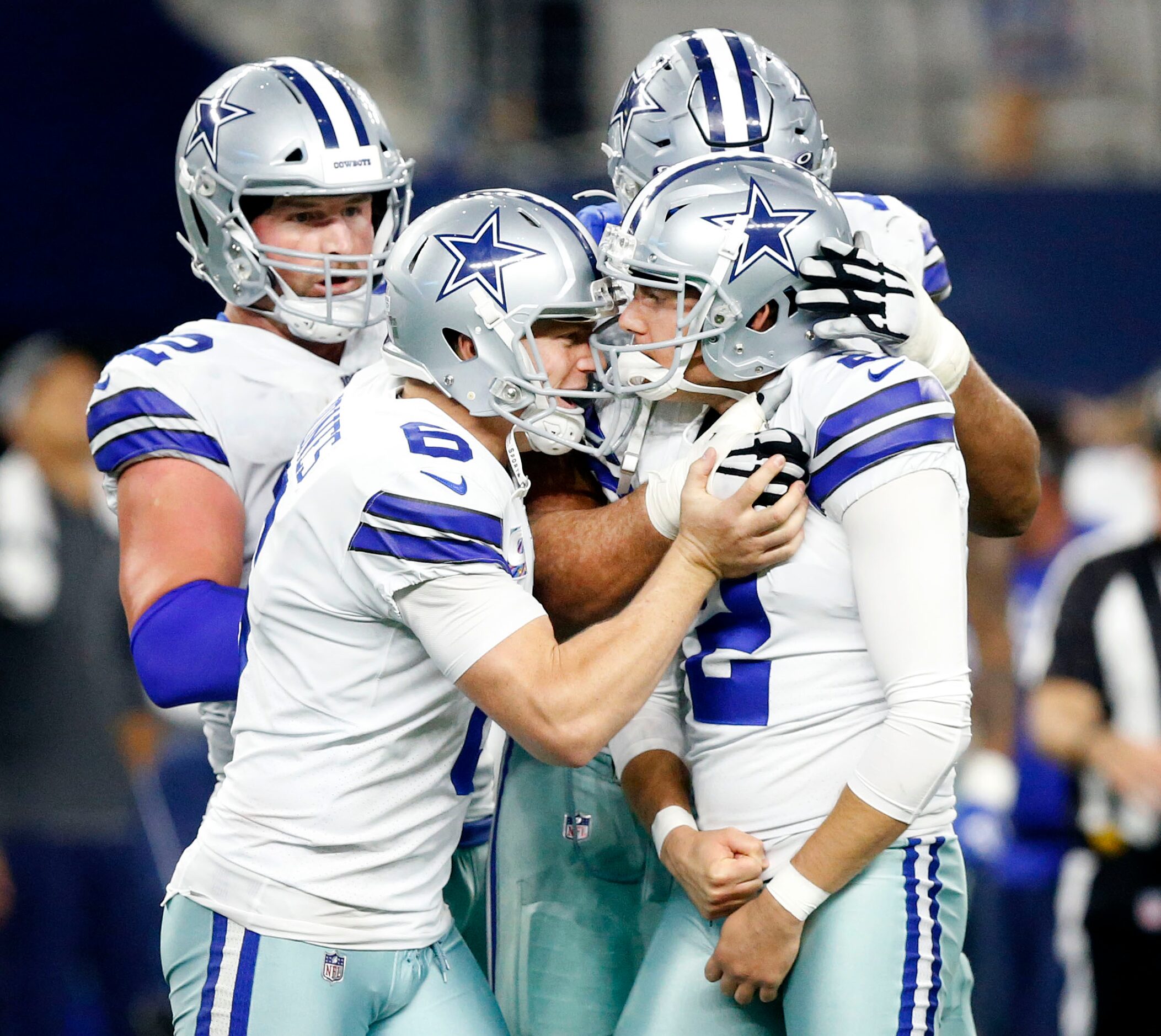 Dallas Cowboys kicker Brett Maher (2) is congratulated on his 65-yard field goal by holder...