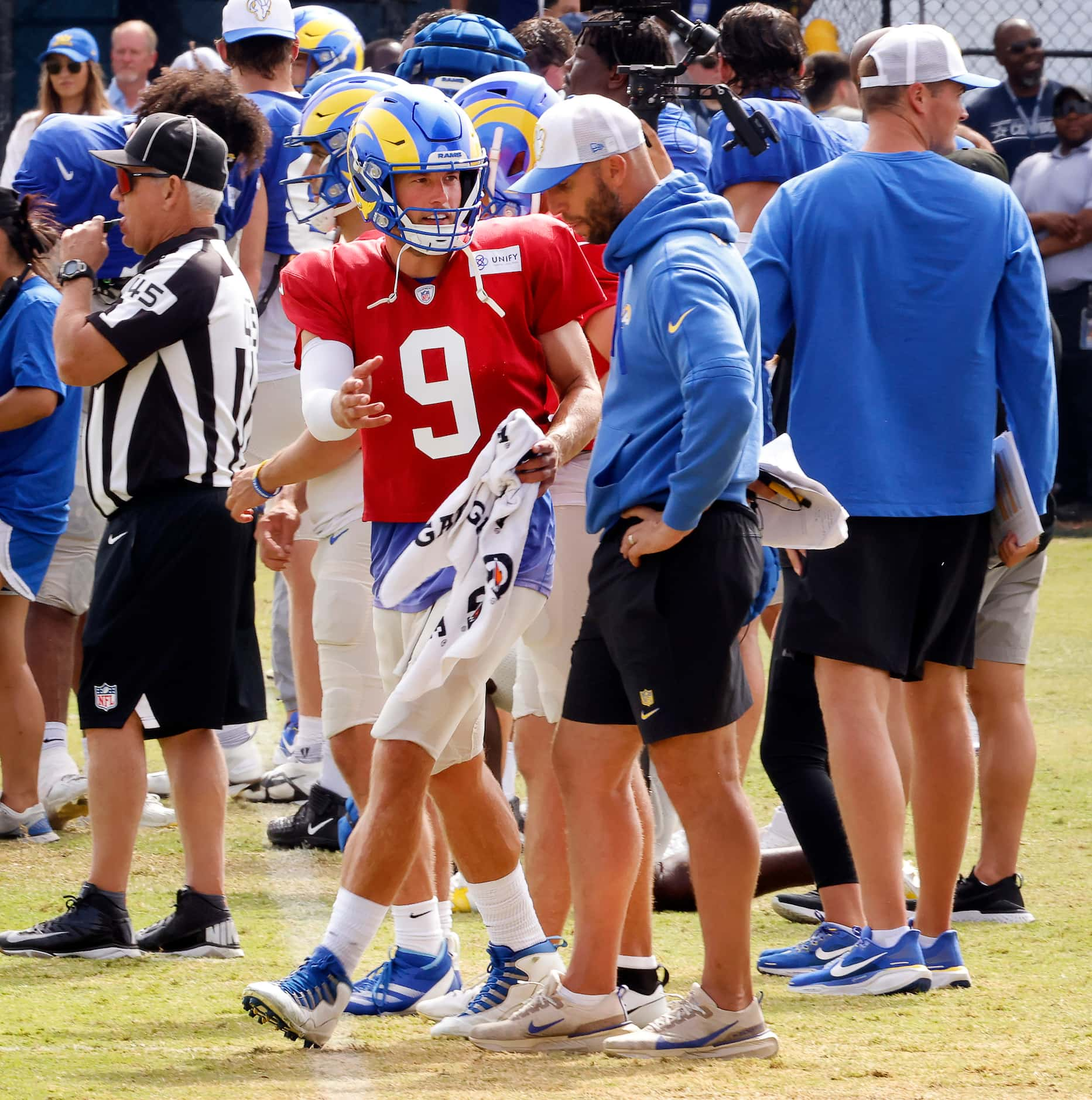 Los Angeles Rams quarterback Matthew Stafford (9) of Highland Park demonstrates the pass...