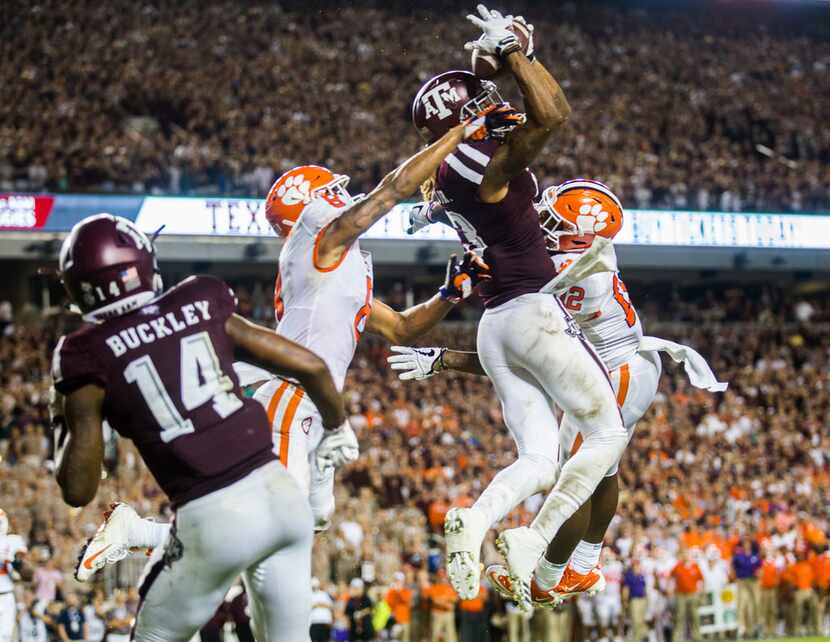 Texas A&M Aggies wide receiver Kendrick Rogers (13) catches a pass in the end zone for a...