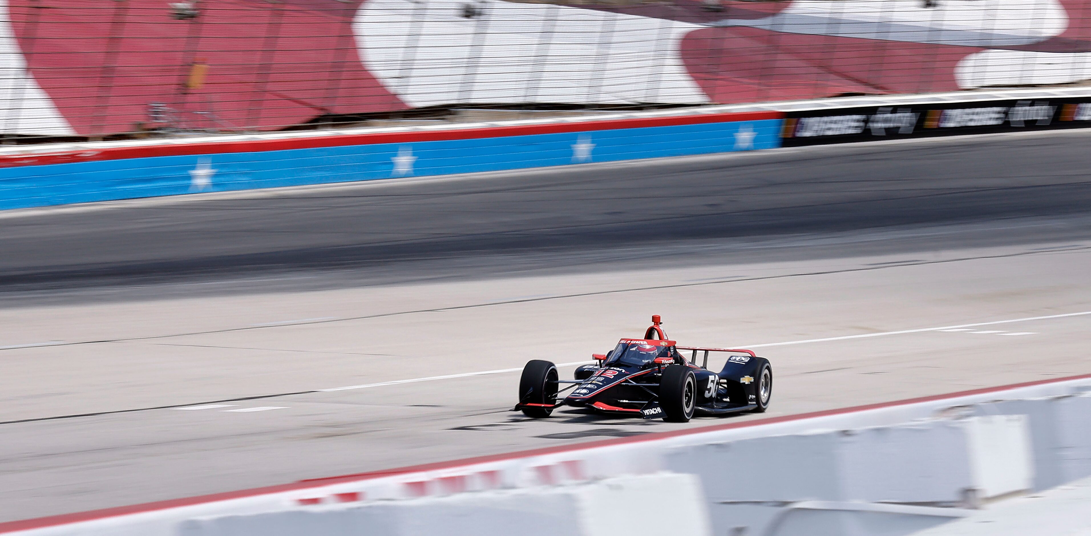 Indy Car driver Will Power practices at Texas Motor Speedway in preparation for the upcoming...