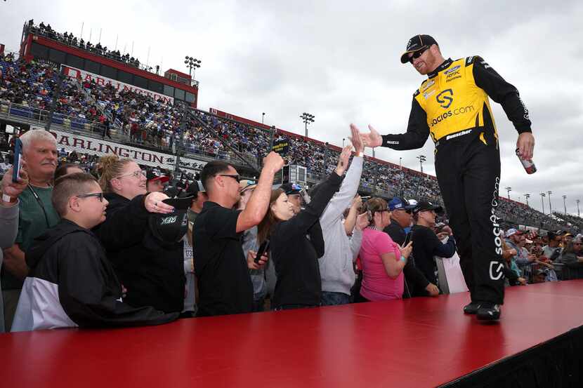 DARLINGTON, SOUTH CAROLINA - MAY 08: Chris Buescher, driver of the #17 Socios.com Ford, high...