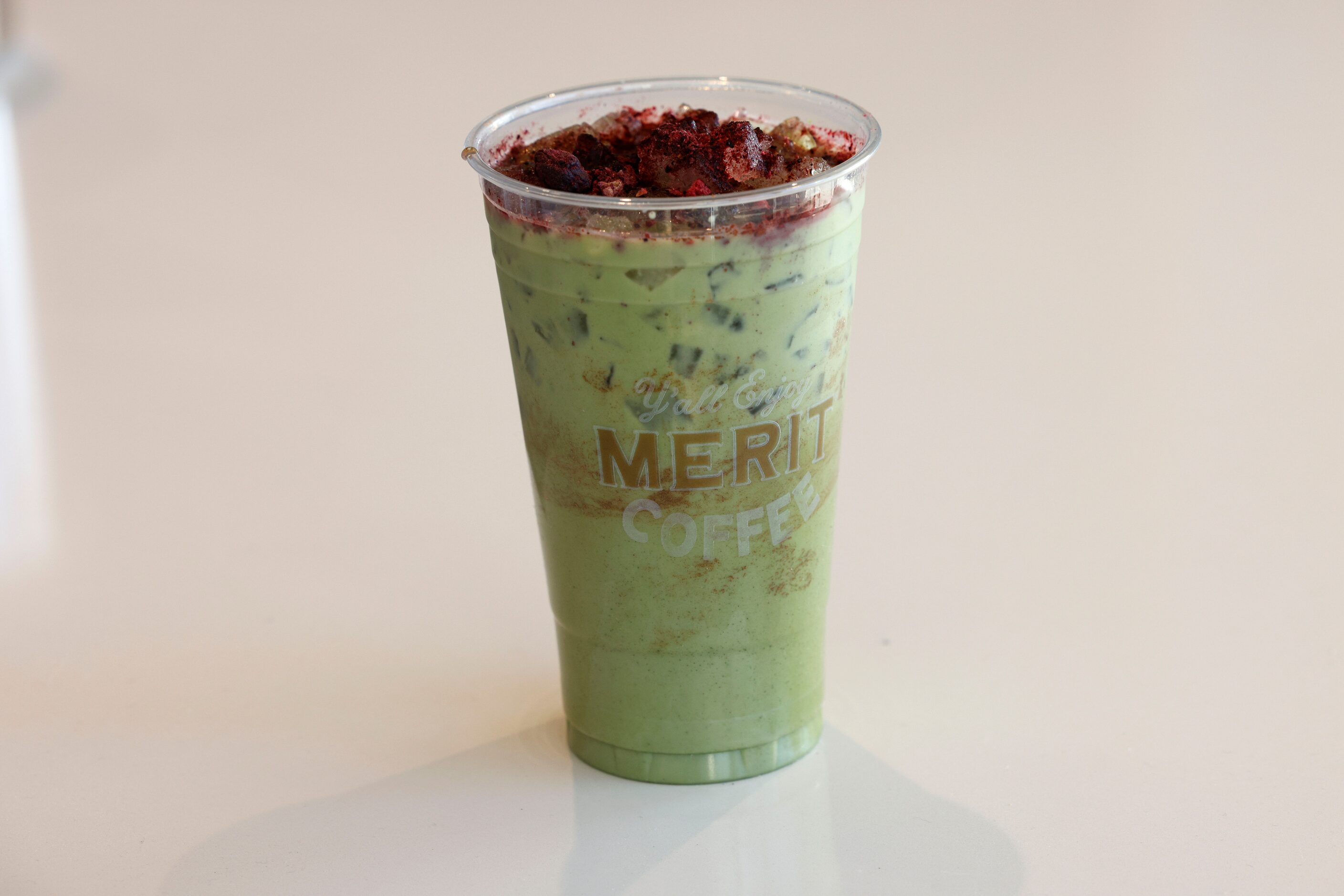 A Berry Cobbler Matcha is seen during a soft opening of a new Merit Coffee shop at 4124...