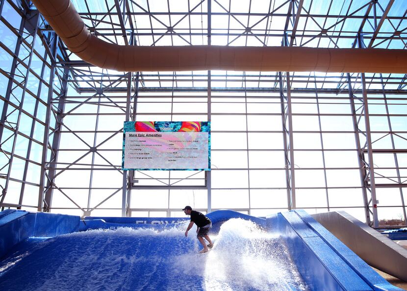 The FlowRider surfing simulator is demonstrated at Epic Waters.