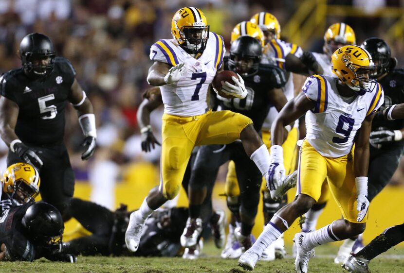 LSU running back Leonard Fournette (7) runs with the ball during the second half of an NCAA...