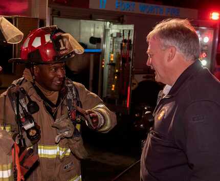 Fort Worth fire Capt. Bobby Washington rescued a little boy who was trapped in a house that...