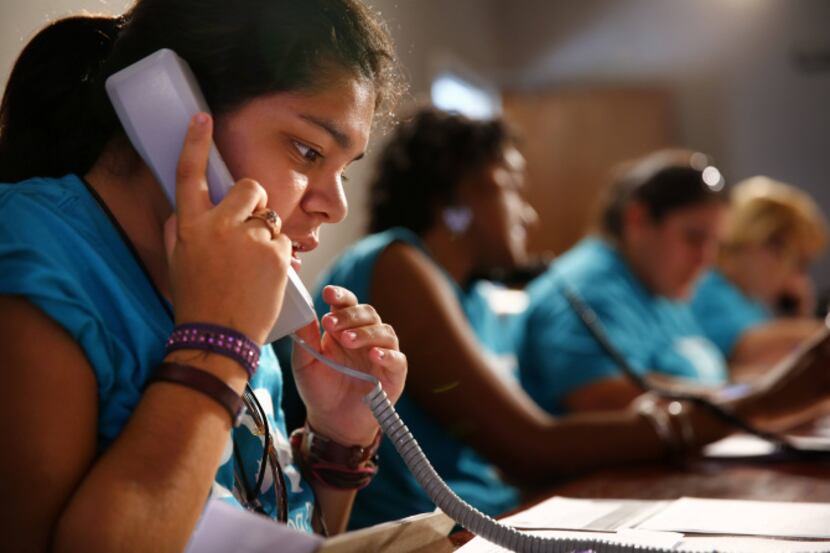 Texas Organizing Project volunteer Jessica Martinez talked with a caller Tuesday about the...