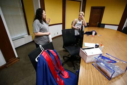 Wendy Birdsall (left) talks to Isabella de Cardenas before her class at Dallas Hall on Friday.