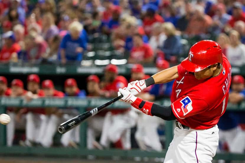 Texas Rangers outfielder Shin-Soo Choo singles in his first at bat since returning from the...