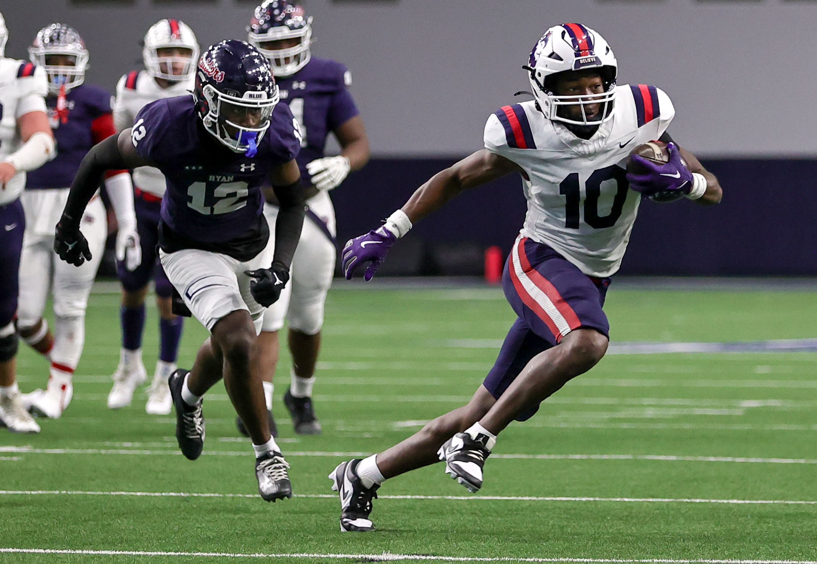 Richland running back Jayshon Gibson (10) gets past Denton Ryan defensive back Mun'terrius...