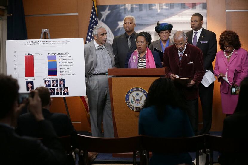  Texas Reps. Sheila Jackson Lee and Marc Veasey join other House Democrats at a press...