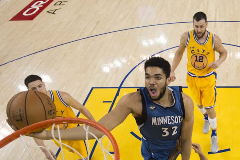 Minnesota Timberwolves center Karl-Anthony Towns repeated seventh grade in order to gain an...