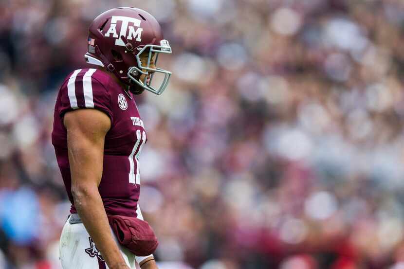 Texas A&M Aggies quarterback Kellen Mond (11) looks to the sideline for a play call during...