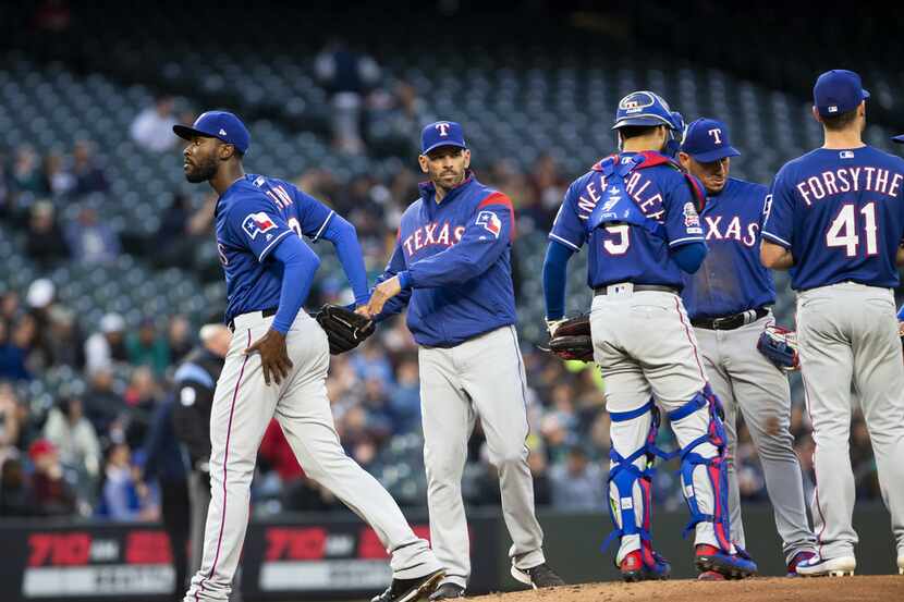 SEATTLE, WA - APRIL 25:  Taylor Hearn #63 of the Texas Rangers is taken out of the game by...