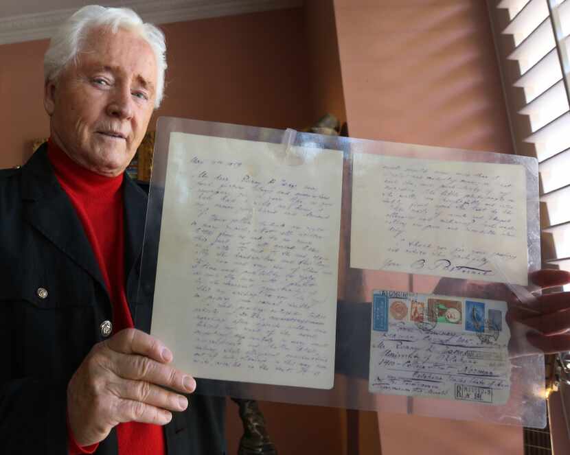 Ron Jones poses with a letter from Doctor Zhivago author Boris Pasternak he received as a...