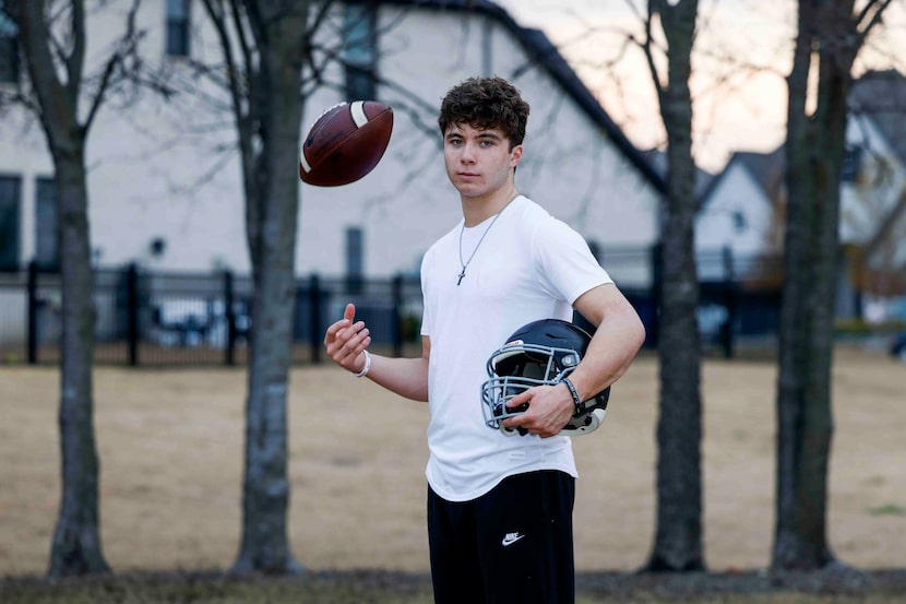 Rock Hill high school football player Kevin Sperry Jr. poses for a portrait outside of their...