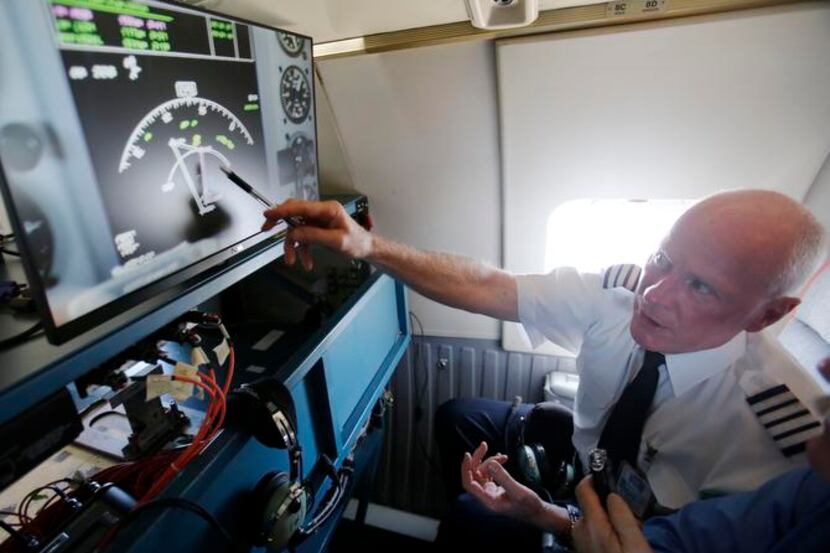 
Captain Bill Lusk of Southwest Airlines explains what the radar is showing to the media on...