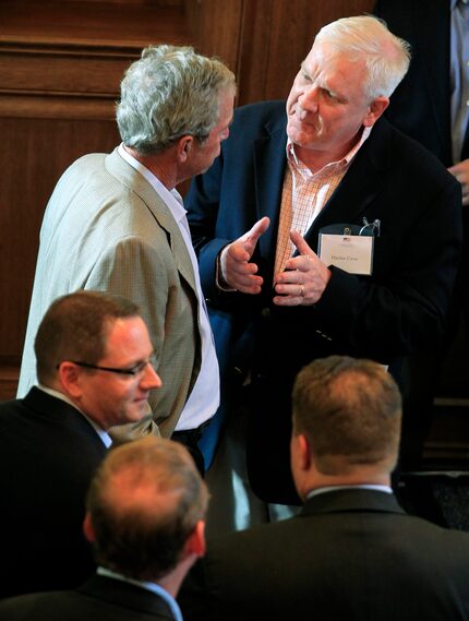 In 2012, Harlan Crow (top right) visited with former President George W. Bush (top left)...