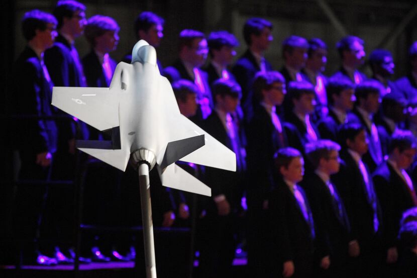 A model of an F-35 fighter and the Texas Boys Choir take part in the Lockheed Martin...