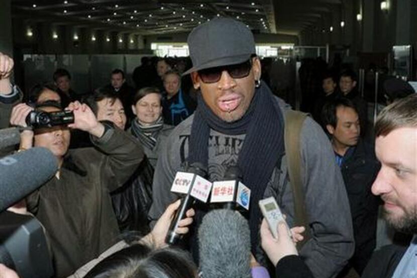 Former NBA star Dennis Rodman speaks to the media at the Pyongyang Airport in Pyongyang,...