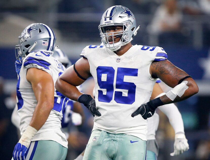 Dallas Cowboys defensive tackle David Irving (95) catches his breath between fourth quarter...