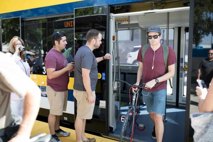 People entered the Dallas Streetcar at the Union Station stop last month during a...