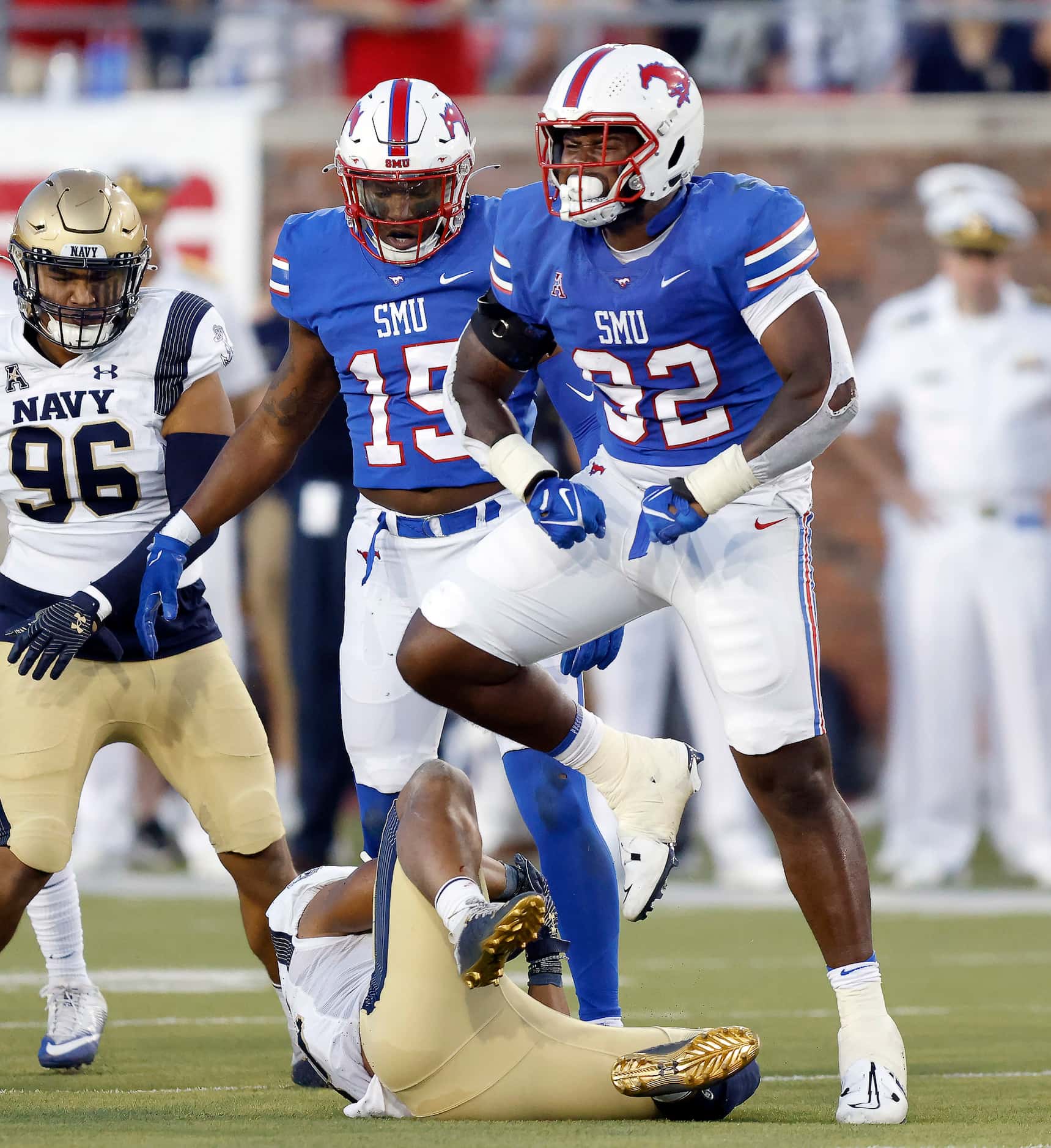 Southern Methodist Mustangs defensive tackle Stephon Wright (92) celebrates his stop of Navy...